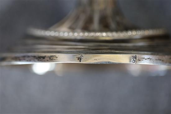 An Edwardian silver four division cigar case, Birmingham, 1906, 13.2cm, gross 5oz and a pair of white metal candlesticks